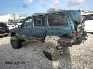 1998 Jeep Cherokee Country with VIN 1J4FT78S8XL520854, listed as a Copart auction lot 79304214 with 111,674 mi miles and Clean title. Bid and sale history available at DreamBid. Image 2.