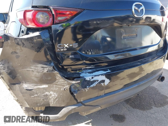 2019 Mazda CX-5 Sport with VIN JM3KFABM7K1579747, listed as a IAAI auction lot 41965097 with 151,042 mi miles and . Bid and sale history available at DreamBid. Image 18.