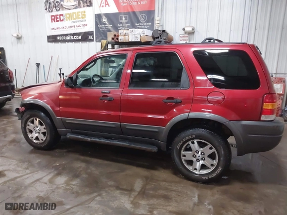 2003 Ford Escape XLT Popular 2 with VIN 1FMCU93173KA52806, listed as a IAAI auction lot 41696250 with 138,338 mi miles. Bid and sale history available at carsss.com. Image 14.