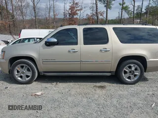 2010 Chevrolet Suburban LTZ with VIN 1GNUCKE05AR173031, listed as a IAAI auction lot 41729084 with 254,790 mi miles and . Bid and sale history available at DreamBid. Image 14.