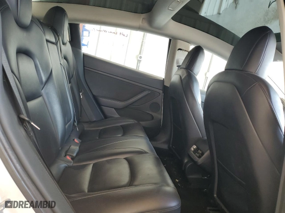 2021 Tesla Model 3 Standard Range Plus with VIN 5YJ3E1EA5MF089643, listed as a Copart auction lot 65789514 with 65,146 mi miles and Clean Title. Bid and sale history available at carsss.com. Image 10.