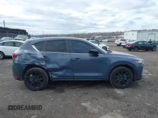 2021 Mazda CX-5 Touring with VIN JM3KFBCM5M0483547, listed as a IAAI auction lot 41683694 with 55,791 mi miles. Bid and sale history available at carsss.com. Image 13.