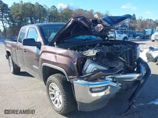 2016 GMC Sierra 1500 SLE with VIN 1GTV2MEC5GZ314842, listed as a IAAI auction lot 41592073 with 56,934 mi miles. Bid and sale history available at carsss.com. Image 1.