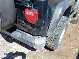 2000 Jeep Wrangler Sport with VIN 1J4FA49S8YP749547, listed as a IAAI auction lot 41861030 with 110,186 mi miles and . Bid and sale history available at DreamBid. Image 6.