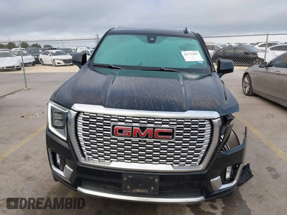 2021 GMC Yukon Denali with VIN 1GKS2DKL3MR308321, listed as a IAAI auction lot 41771365 with 63,415 mi miles. Bid and sale history available at carsss.com. Image 6.