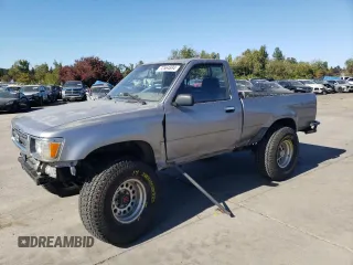 1995 Toyota Pickup DX z VIN 4TARN01P7SZ325940, wystawiony jako Copart lot #72564894 z przebiegiem 215 120 mil mil oraz Szkoda całkowita • Salvage title. Historia ofert i sprzedaży dostępna na DreamBid. Obrazek 1.