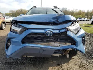 2023 Toyota RAV4 Hybrid XLE with VIN 2T3UWRFV1PW151099, listed as a Copart auction lot 54899775 with 83,437 mi miles and Salvage title. Bid and sale history available at DreamBid. Image 5.