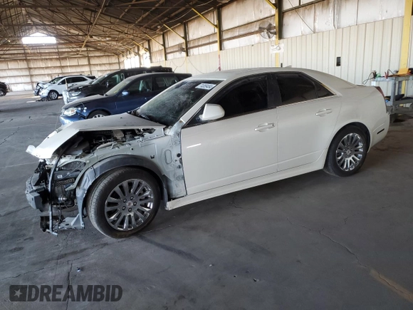 2011 Cadillac CTS Performance with VIN 1G6DJ5EY8B0158893, listed as a Copart auction lot 74089484 with 124,439 mi miles and Salvage Title. Bid and sale history available at carsss.com. Image 1.