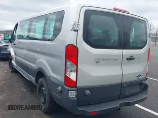 2018 Ford Transit Passenger XL z VIN 1FBZX2ZM2JKB02141, wystawiony jako IAAI lot #41914073 z przebiegiem 103 718 mil mil oraz . Historia ofert i sprzedaży dostępna na DreamBid. Obrazek 3.