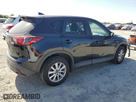 2016 Mazda CX-5 Touring z VIN JM3KE2CY5G0617516, wystawiony jako Copart lot #56421005 z przebiegiem 110 739 mil mil oraz Szkoda całkowita • Salvage title. Historia ofert i sprzedaży dostępna na DreamBid. Obrazek 3.