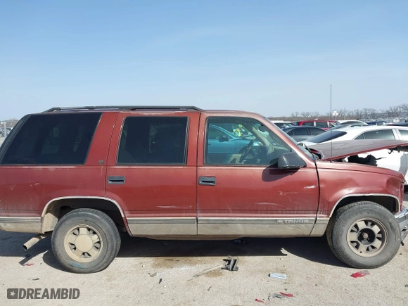 1999 Chevrolet Tahoe with VIN 1GNEC13R9XJ341261, listed as a IAAI auction lot 41741710 with 234,676 mi miles. Bid and sale history available at carsss.com. Image 12.