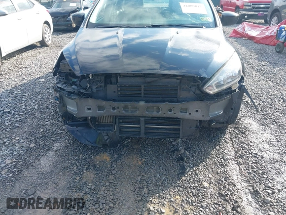 2018 Ford Focus SE z VIN 1FADP3FE9JL255818, wystawiony jako IAAI lot #42009017 z przebiegiem 79 329 mil mil oraz . Historia ofert i sprzedaży dostępna na DreamBid. Obrazek 6.