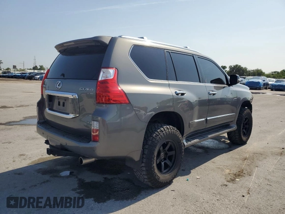 2010 Lexus GX 460 Premium with VIN JTJJM7FX5A5011762, listed as a Copart auction lot 56207715 with 185,360 mi miles and Salvage title. Bid and sale history available at DreamBid. Image 3.