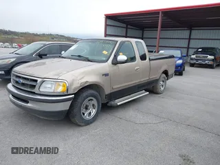 1997 Ford F-150 with VIN 2FTEX17L2VCA10536, listed as a IAAI auction lot 41917990 with 296,879 mi miles and . Bid and sale history available at DreamBid. Image 2.