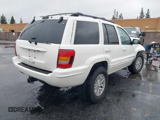 2004 Jeep Grand Cherokee Limited with VIN 1J4GW58S24C417604, listed as a IAAI auction lot 41578234 with Not provided miles and . Bid and sale history available at DreamBid. Image 4.