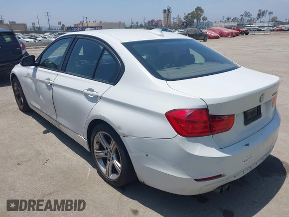 2014 BMW 3 Series 328i with VIN WBA3C1C59EK111396, listed as a IAAI auction lot 42471040 with 182,636 mi miles and . Bid and sale history available at DreamBid. Image 3.