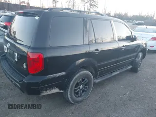 2003 Honda Pilot EX with VIN 2HKYF18423H506550, listed as a IAAI auction lot 41766510 with 999,999 mi miles. Bid and sale history available at carsss.com. Image 4.