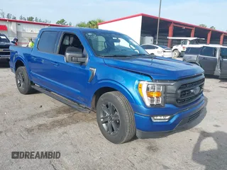 2023 Ford F-150 XL with VIN 1FTEW1C55PKE92556, listed as a IAAI auction lot 42611292 with 27,733 mi miles and . Bid and sale history available at DreamBid. Image 1.