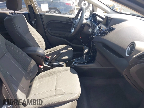2019 Ford Fiesta SE z VIN 3FADP4BJ2KM131012, wystawiony jako IAAI lot #42228822 z przebiegiem 100 460 mil mil oraz . Historia ofert i sprzedaży dostępna na DreamBid. Obrazek 5.