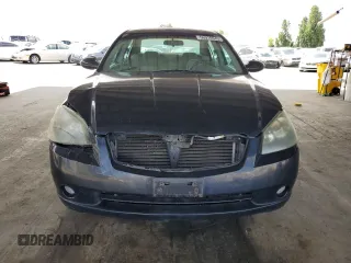 2005 Nissan Altima 2.5 with VIN 1N4AL11D45C155651, listed as a Copart auction lot 56910945 with 115,877 mi miles and Salvage title. Bid and sale history available at DreamBid. Image 5.