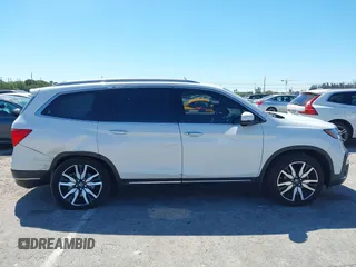 2022 Honda Pilot Touring 7-Passenger с VIN 5FNYF5H66NB034248, выставлен на аукционе IAAI как лот 41777362 с пробегом 26 611 миль миль и . История ставок и продаж доступна на DreamBid. Изображение 12.