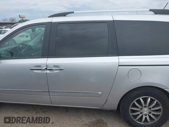 2012 Kia Sedona EX with VIN KNDMH4C74C6497243, listed as a IAAI auction lot 41368080 with 218,806 mi miles. Bid and sale history available at carsss.com. Image 14.