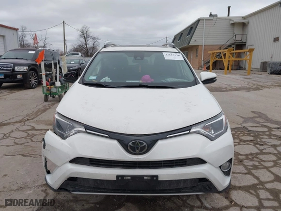 2018 Toyota RAV4 XLE with VIN JTMRFREV6JJ734927, listed as a IAAI auction lot 41510616 with 119,687 mi miles. Bid and sale history available at carsss.com. Image 12.
