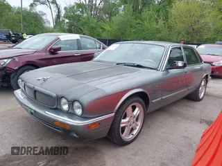 2002 Jaguar XJ with VIN SAJDA12CX2LF49531, listed as a IAAI auction lot 42124743 with 120,486 mi miles. Bid and sale history available at carsss.com. Image 2.