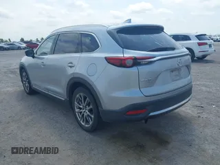 2016 Mazda CX-9 Signature with VIN JM3TCBEY9G0117785, listed as a IAAI auction lot 42331883 with 115,096 mi miles and . Bid and sale history available at DreamBid. Image 3.