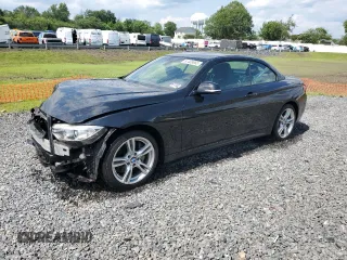 2015 BMW 4 Series 435i xDrive with VIN WBA3T7C57FPW79797, listed as a Copart auction lot 61408865 with 54,557 mi miles and Salvage title. Bid and sale history available at DreamBid. Image 1.