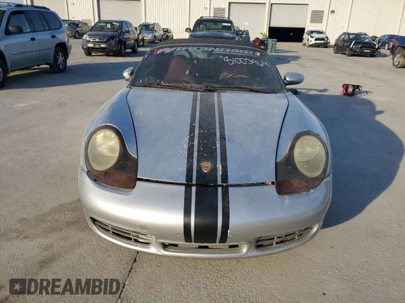 1998 Porsche Boxster с VIN WP0CA2987WS620369, выставлен на аукционе Copart как лот 81003964 с пробегом Не указан миль и Списание • Salvage title. История ставок и продаж доступна на DreamBid. Изображение 5.