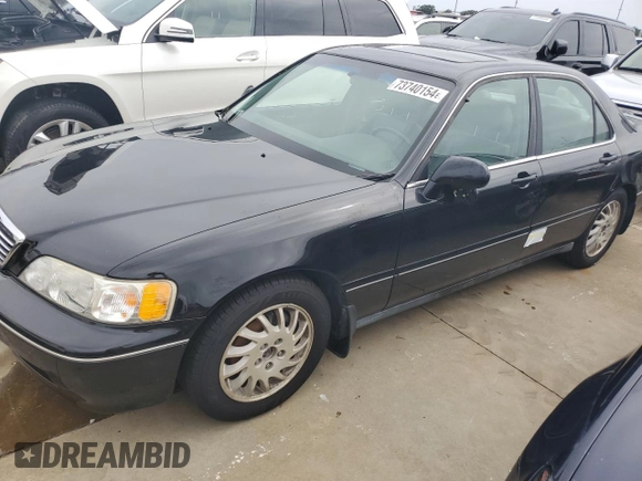 1998 Acura RL Premium with VIN JH4KA9656WC001298, listed as a Copart auction lot 73740154 with 108,066 mi miles and Salvage Title. Bid and sale history available at carsss.com. Image 1.