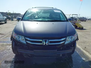 2015 Honda Odyssey Touring Elite с VIN 5FNRL5H93FB056183, выставлен на аукционе IAAI как лот 42073205 с пробегом 119 874 миль миль и . История ставок и продаж доступна на DreamBid. Изображение 13.