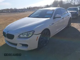 2015 BMW 6 Series 650i with VIN WBA6B2C54FGB99173, listed as a IAAI auction lot 41692594 with 123,664 mi miles and . Bid and sale history available at carsss.com. Image 2.