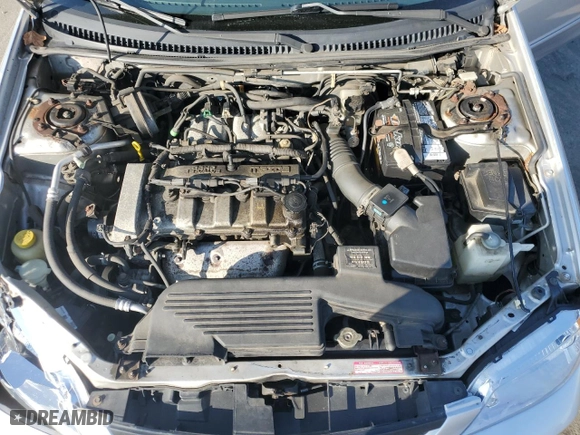 2003 Mazda Protege DX with VIN JM1BJ226631171658, listed as a Copart auction lot 74337864 with 94,058 mi miles and Salvage Title. Bid and sale history available at carsss.com. Image 11.