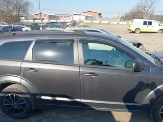 2018 Dodge Journey SE with VIN 3C4PDCAB4JT295807, listed as a IAAI auction lot 41743064 with 105,836 mi miles and . Bid and sale history available at DreamBid. Image 14.