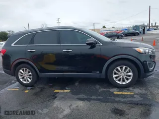 2016 Kia Sorento LX with VIN 5XYPGDA51GG132183, listed as a IAAI auction lot 41804837 with 111,011 mi miles. Bid and sale history available at carsss.com. Image 13.