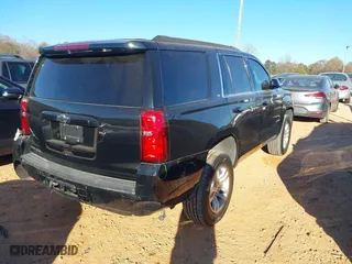2019 Chevrolet Tahoe LT with VIN 1GNSKBKC2KR365355, listed as a IAAI auction lot 41032993 with 250,419 mi miles. Bid and sale history available at carsss.com. Image 4.