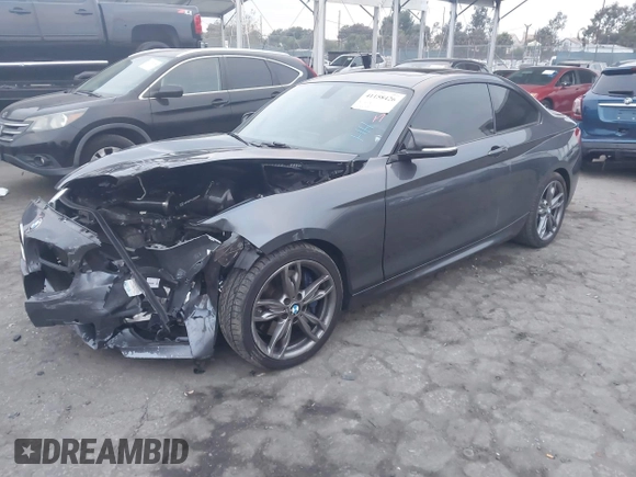 2016 BMW 2 Series M235i with VIN WBA1J7C50GV360395, listed as a IAAI auction lot 41158426 with 81,208 mi miles. Bid and sale history available at carsss.com. Image 2.