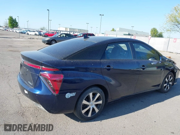 2016 Toyota Mirai with VIN JTDBVRBD6GA000989, listed as a IAAI auction lot 42098383 with 63,686 mi miles and . Bid and sale history available at DreamBid. Image 4.