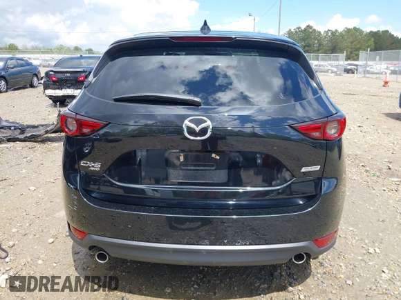 2019 Mazda CX-5 Grand Touring with VIN JM3KFBDM7K0518603, listed as a IAAI auction lot 39185478 with 42,805 mi miles. Bid and sale history available at carsss.com. Image 16.