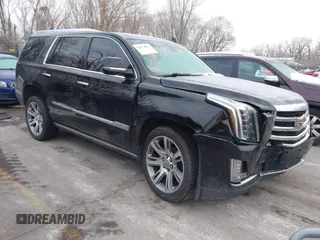 2017 Cadillac Escalade Premium Luxury z VIN 1GYS4CKJ8HR352622, wystawiony jako IAAI lot #41274867 z przebiegiem 98 053 mil mil oraz . Historia ofert i sprzedaży dostępna na DreamBid. Obrazek 1.