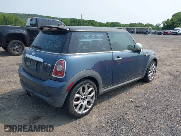 2010 MINI Hardtop S with VIN WMWMF7C54ATZ74321, listed as a IAAI auction lot 42409281 with 193,547 mi miles and . Bid and sale history available at DreamBid. Image 4.