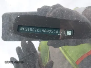 2021 Toyota Highlander L z VIN 5TDCZRBH6MS528171, wystawiony jako IAAI lot #40330366 z przebiegiem 75 297 mil mil oraz . Historia ofert i sprzedaży dostępna na DreamBid. Obrazek 17.