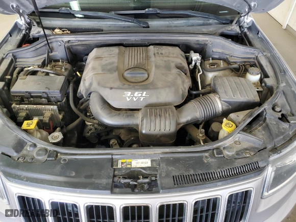 2014 Jeep Grand Cherokee Limited with VIN 1C4RJFBG9EC205632, listed as a Copart auction lot 50808745 with 122,357 mi miles and Salvage Title. Bid and sale history available at carsss.com. Image 12.