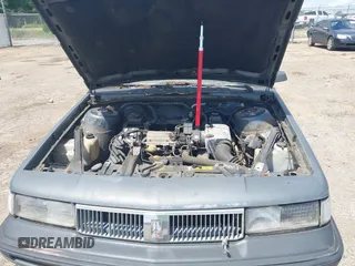 1989 Oldsmobile Cutlass Ciera with VIN 2G3AJ51NXK2439345, listed as a IAAI auction lot 42128301 with 241,434 mi miles and . Bid and sale history available at DreamBid. Image 10.