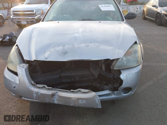 2002 Nissan Altima S with VIN 1N4AL11D72C174190, listed as a IAAI auction lot 41390812 with 171,646 mi miles. Bid and sale history available at carsss.com. Image 6.