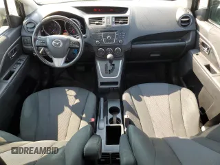 2013 Mazda 5 Touring with VIN JM1CW2CL5D0152715, listed as a Copart auction lot 71315534 with 219,315 mi miles and Salvage Title. Bid and sale history available at DreamBid. Image 8.