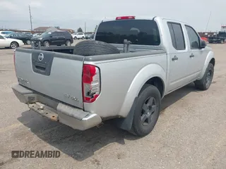 2011 Nissan Frontier Pro-4X with VIN 1N6AD0EV8BC434100, listed as a IAAI auction lot 42745419 with 264,222 mi miles and . Bid and sale history available at DreamBid. Image 4.