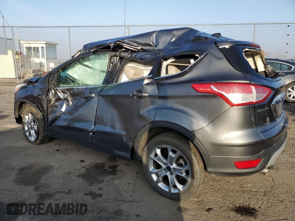 2015 Ford Escape Titanium with VIN 1FMCU0J99FUA26849, listed as a Copart auction lot 50583825 with Not provided miles and Salvage title. Bid and sale history available at DreamBid. Image 2.